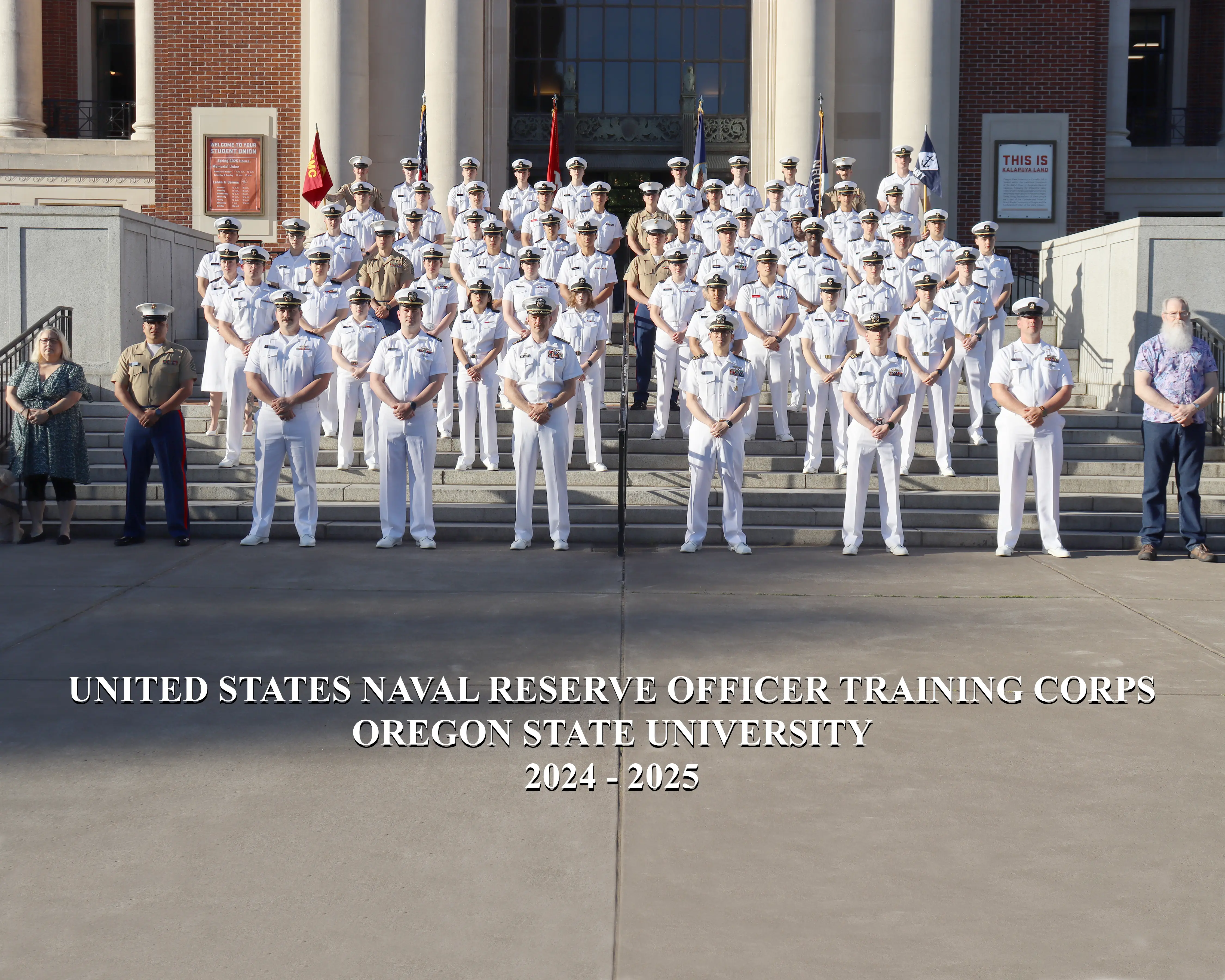 Students and staff standing at attention on the Memorial Union Steps